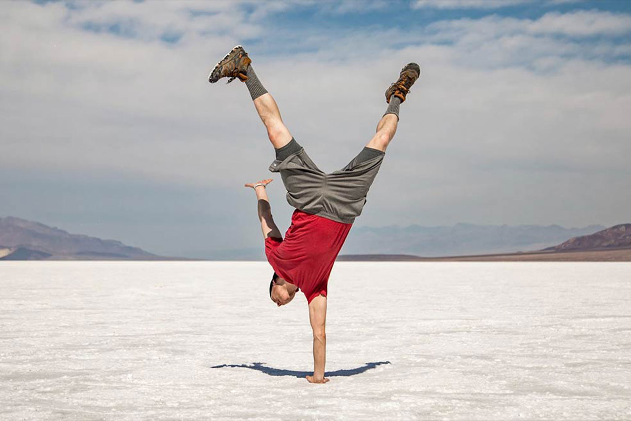 a man doing a handstand