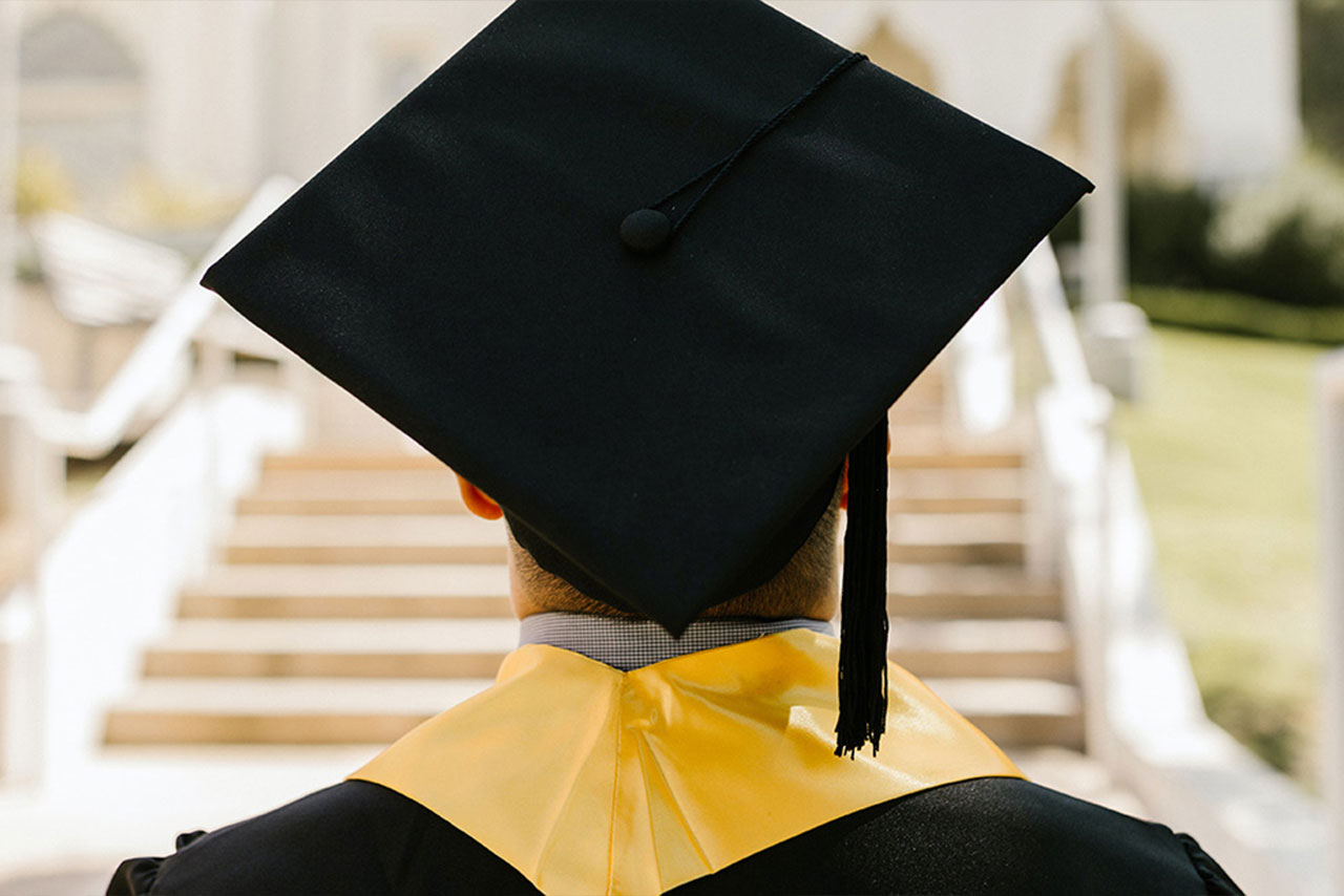 A student in a cap and gown