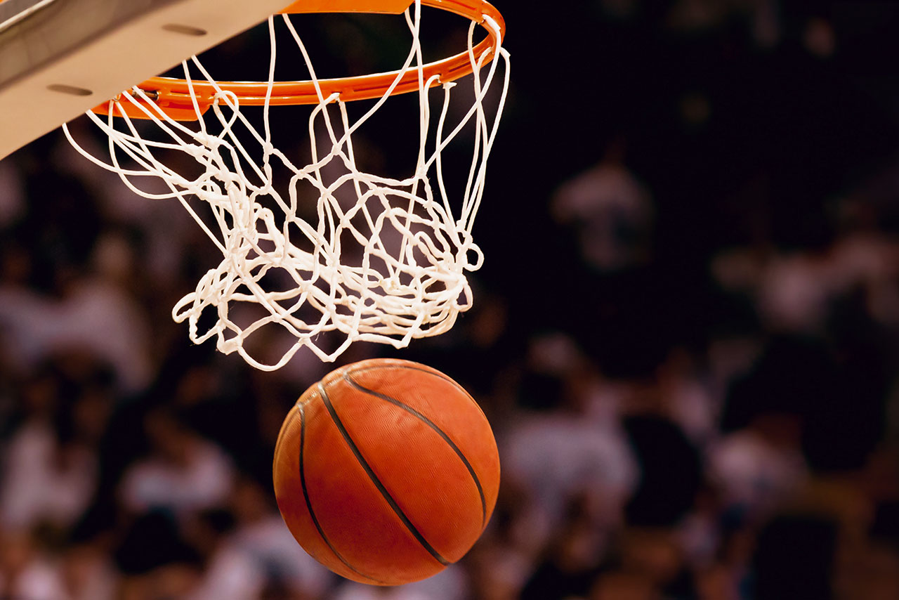Basketball going through a hoop